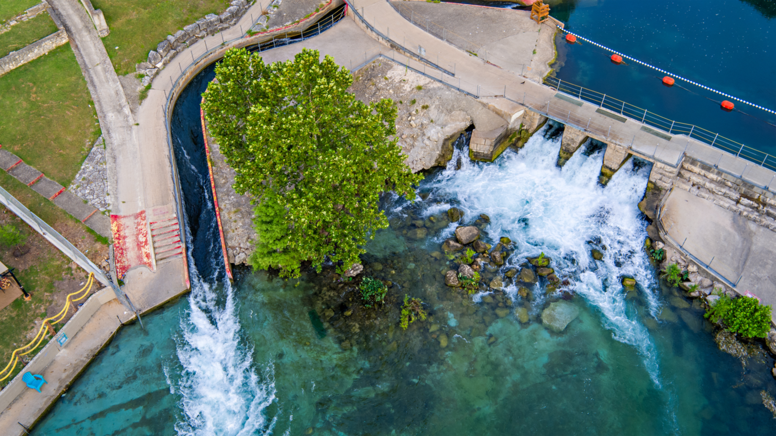 Tube chute on the spring-fed Comal River in New Braunfels during summer